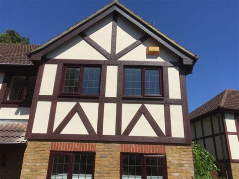 mock tudor cladding installation.